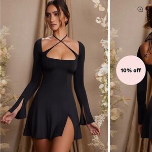 SALOME
Long Sleeve Cross Over Strap Mini Dress in Black